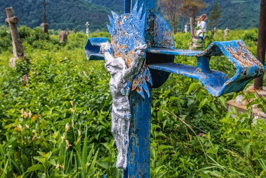 Metal cross on abandoned cemetery in former town of Chervonohorod - Chervone, Ukraine