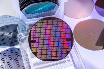 Macro of silicon wafer semiconductor with neon color, integrated circuits to manufacture CPU and GPU