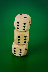close up of dices on green backgound