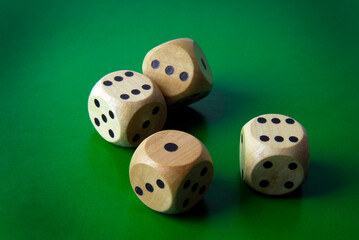 close up of dices on green backgound