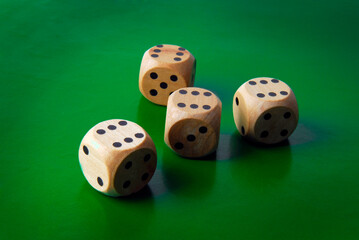 close up of dices on green backgound