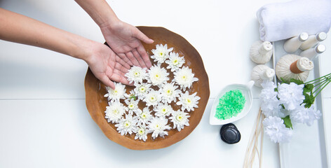 Asian woman in wellness beauty spa having aroma therapy massage with essential oil, Thailand