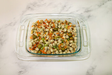 Prepared thanksgiving stuffing ready for baking in the oven. 