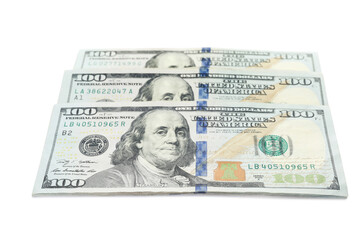 Many dollar banknotes on white background. American national currency