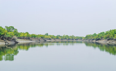 Fototapeta premium Amazing landscape of lake with clear green water and Perfect sky. Panoramic view of the beautiful mountain landscape.