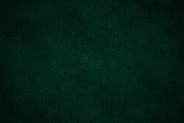 Dark green color solid textured cement plaster wall surface for background