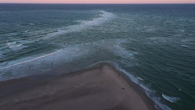 Drone Over People Walking Along Grenen Sandbar