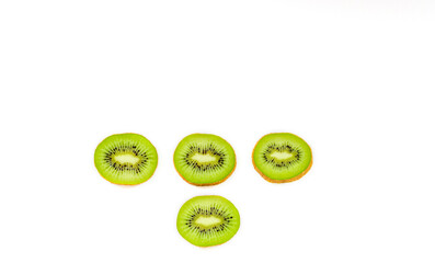 kiwi slices on a white surface, background, banner