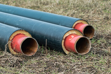 Metal pipes with thermal insulation of the district heating system for minimal heat loss. Sustainable heat pipes for the water supply of modern homes.