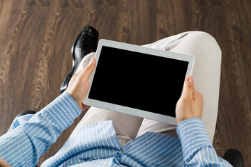 businessman with a tablet, works in the office