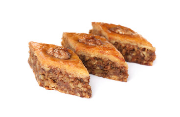 Delicious honey baklava with walnuts on white background