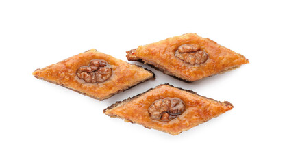 Delicious honey baklava with walnuts on white background, top view