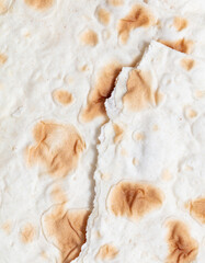 Lavash flatbread as a background.