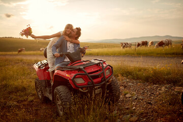 Young woman at white are enjoying quad ride in the nature with her man.Freedom,nature,wedding and trip © luckybusiness
