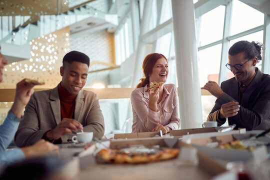 Young Business Team Is Having A Good Time During A Lunch Break In The Company Building. Business, People, Company