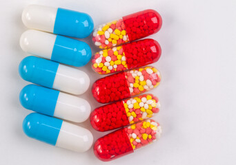 Colorful pill capsule on white background. with free space