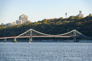 View to Pedestrian bridge over the Dnipro Dnieper River in Kyiv, Ukraine. October 2021
