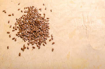 linen seeds for planting on wooden background