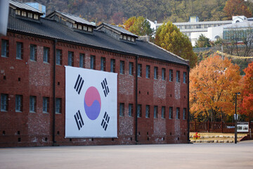 A large Taegeukgi is hung in a prison built during the Japanese colonial period.