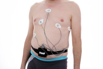 European white man wearing a holter who records a heart work. 