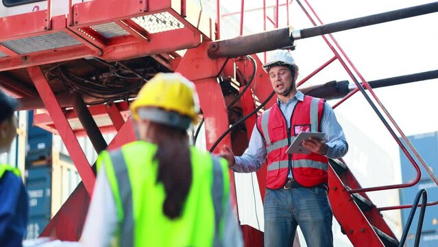 Hispanic man worker protest leader speaking with protester in workplace factory. Activist and leader