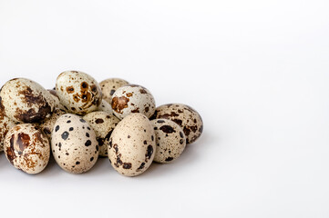 Fototapeta premium quail eggs on white background. Home cooking. The idea of healthy breakfast, symbol of Easter. Copy space