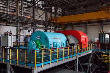 Power station equipment. Steam turbine and generator machine in workshop. Rudny, Kostanay region, Kazakhstan. Sokolovo-Sarbay plant.