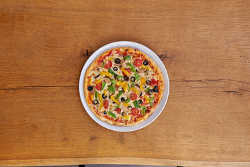 Single Ready Baked Pizza on the center of table