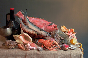 Sea products. Fish mackerel, flounder, sea bass, sea shells, a bottle of wine on the table.