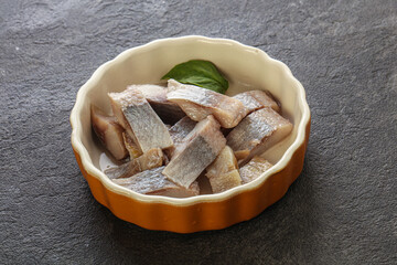 Sliced herring fillet in the bowl