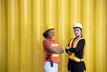 Two female workers in a cargo warehouse. 