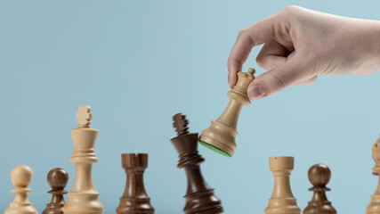 Player defeating his opponent and winning at chess