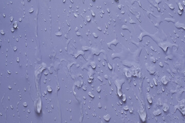 
water flowing on the wall The rain poured down on the walls. background wall with rain water flowing through the background
