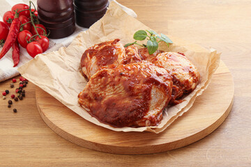 Marinated chicken leg in tomato sauce