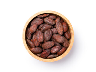 Cocoa beans in wooden bowl isolated on white background with clipping path. Top view. Flat lay.