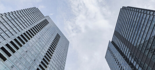 Obraz premium Group of Common modern business skyscrapers, high-rise buildings, architecture raising to the sky in Jakarta, Indonesia. Concepts of financial, economics, future etc.