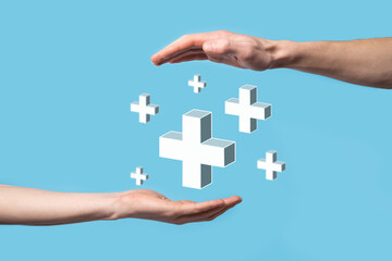 Hand hold 3D plus icon, man hold in hand offer positive thing such as profit, benefits, development, CSR represented by plus sign.The hand shows the plus sign