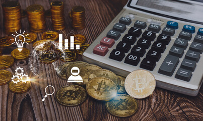Golden bitcoin digital currency, crypto money on calculator.