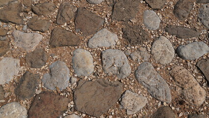 Texture of a stone wall. Old castle stone wall texture background. Stone wall as a background or texture. Part of a stone wall, for background or texture