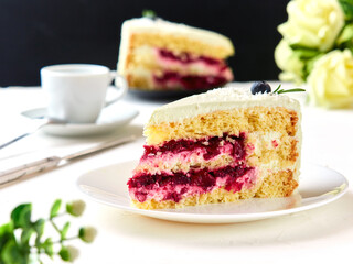 Confectionery. Cake with cherries and whipped cream.