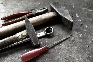 Closeup of old repairing tools on a ground