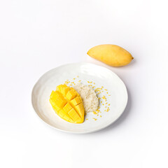Thai Mango Sticky Rice, Southeast Asian dessert white plate on white background