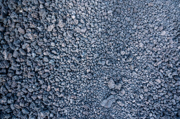 Texture of gravel stones on the ground background