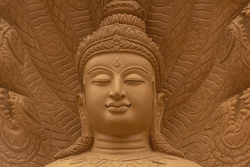 The face of the Buddha image has beautiful art patterns.