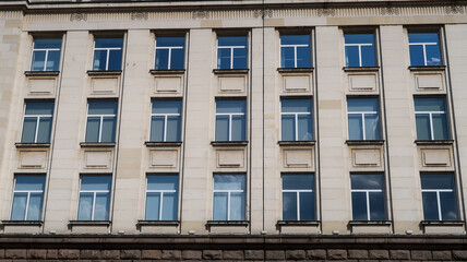 Front view window architecture of monumental, communist-era shopping mall in Sofia, Bulgaria
