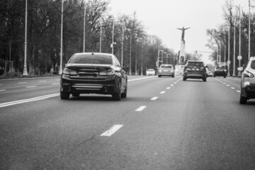 traffic. daytime photography. cars in traffic parked at a traffic light.