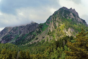 Obraz premium Fog on a peak near Lake St. Mauritius