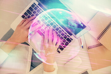 Double exposure of woman hands working on computer and tech theme hologram drawing. Top View....