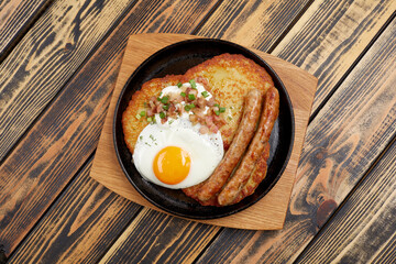 potato pancakes with egg and bacon