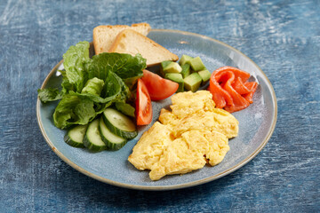 omelet with fresh vegetables and salmon